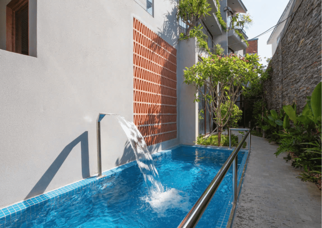 NHÀ 4 TẦNG CÓ HỒ BƠI VÀ SÂN VƯỜN CHUNG ĐƯỜNG TRẦN VĂN THÀNH GẦN BIỂN MỸ AN